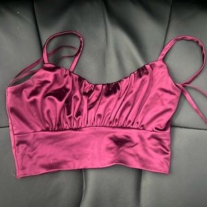 Cute top, zip up in back. Xs.